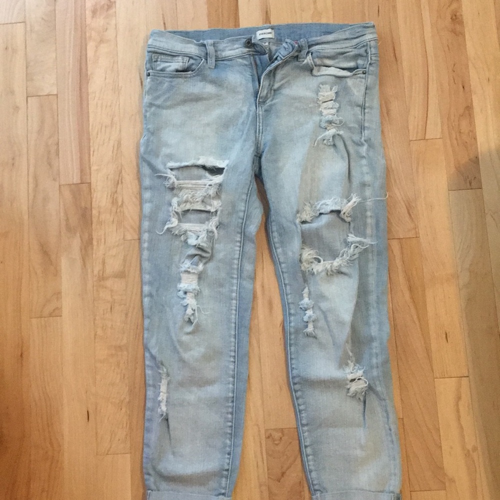 Light color destroyed jeans with cuff bottom